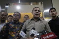 firli-bahuri-usai-menjalani-pemeriksaan-di-bareskrim-polri_20231201_211812.jpg