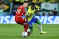 Gelandang Swiss Fabian Rieder Hadang Vinicius Junior 