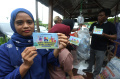 hijaukan-lingkungan-serta-perekonomian-teluk-naga_20240301_182416.jpg