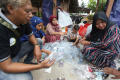 hijaukan-lingkungan-serta-perekonomian-teluk-naga_20240301_182509.jpg