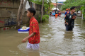 hujan-sejak-dini-hari-banjir-genangi-jakarta_20240229_212428.jpg