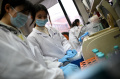 Intip Laboratorium China Penemu Obat Covid-19