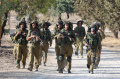 israel-defense-forces-idf-memasuki-perbatasan-di-jalur-gaza_20231020_204700.jpg
