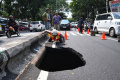 jalan-bandung-kota-malang-amblas_20231207_165557.jpg
