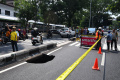 jalan-bandung-kota-malang-amblas_20231207_172048.jpg