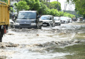 jalan-kawasan-industri-sidoarjo-terendam-air-hujan_20240628_171059.jpg