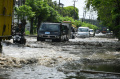 jalan-kawasan-industri-sidoarjo-terendam-air-hujan_20240628_171101.jpg