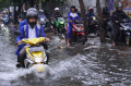 jalan-kopo-citarip-kembali-terendam-banjir_20240217_211535.jpg