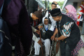 jamaah-calon-haji-tiba-di-asrama-haji-pondok-gede_20240511_121808.jpg