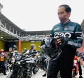 Jokowi Naik Motor dari Sibisa ke Kawasan Pantai Bebas Parapat