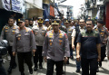 kapolri-kunjungi-lokasi-kebakaran-depo-pertamina-plumpang_20230304_170431.jpg
