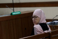 karen-agustiawan-dituntut-11-tahun-penjara_20240530_163444.jpg