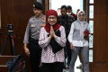 karen-agustiawan-divonis-9-tahun-penjara_20240624_195729.jpg