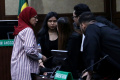 karen-agustiawan-divonis-9-tahun-penjara_20240624_195901.jpg