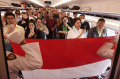kcic-kibarkan-bendera-merah-putih-di-atas-rangkaian-kereta-cepat_20240817_200513.jpg