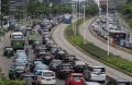 kepadatan-arus-lalu-lintas-di-jalan-sudirman-jakarta_20220518_231100.jpg