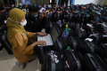 kloter-1-jemaah-calon-haji-dki-jakarta-masuk-asrama-haji_20220603_182539.jpg