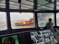 KN Pulau Dana-323 Bakamla RI Padamkan Kapal Terbakar