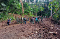 kodim-1623karangasem-melaksankan-tmmd-di-bukit-talas_20240206_121916.jpg