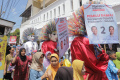 komunitas-ondel-ondel-sosialisasikan-pemilu-damai_20240121_160135.jpg