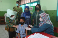 ksp-dan-nestle-dukung-percepatan-vaksinasi-anak-usia-6-11-tahun_20220317_182719.jpg