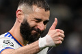 liga-champions-benzema-hattrick-real-madrid-kandaskan-psg_20220311_073244.jpg