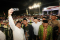 mahfud-md-dan-harry-tanoe-hadiri-sholawat-persatuan-indonesia_20240114_183046.jpg