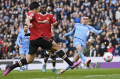manchester-city-kalahkan-manchester-united-4-1_20220307_074345.jpg