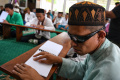 melihat-penyandang-tuna-netra-tadarus-al-quran_20240315_195222.jpg