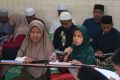 melihat-penyandang-tuna-netra-tadarus-al-quran_20240315_195619.jpg