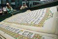 melihat-tadarus-al-quran-raksasa-di-masjid-baiturrahman_20240327_071249.jpg