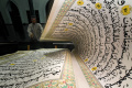 melihat-tadarus-al-quran-raksasa-di-masjid-baiturrahman_20240327_071920.jpg