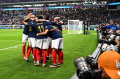 Olivier Giroud Merayakan Kemenangan