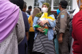 operasi-pasar-beras-murah-di-bandung_20240221_153344.jpg