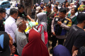 operasi-pasar-beras-murah-di-bandung_20240221_153432.jpg