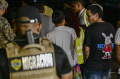 Panama Deportasi Migran Ilegal dengan Tangan dan Kaki Diborgol