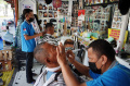 Pangkas Rambut Asgar di Tengah Himpitan Pandemi Covid-19