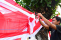 Pedagang Bendera Musiman Mulai Menjamur di Malang