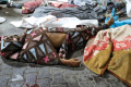 pemandangan-memilukan-setelah-rudal-hantam-rumah-sakit-di-gaza_20231018_095726.jpg