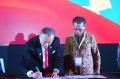 Penandatanganan MOU PSMTI dengan Tribunnews.com