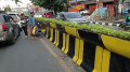 Pengecatan Beton Pembatas Pemisah Jalan