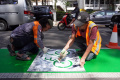 Pengecatan Ulang Jalur Khusus Sepeda di Kota Bandung