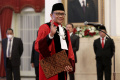 pengucapan-sumpah-jabatan-hakim-konstitusi-ridwan-mansyur_20231208_155429.jpg