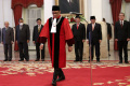 pengucapan-sumpah-jabatan-hakim-konstitusi-ridwan-mansyur_20231208_155529.jpg