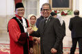 pengucapan-sumpah-jabatan-hakim-konstitusi-ridwan-mansyur_20231208_155747.jpg