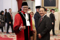 pengucapan-sumpah-jabatan-hakim-konstitusi-ridwan-mansyur_20231208_155909.jpg