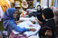 penjualan-seragam-laris-manis-di-ps-kepanjen-kabupaten-malang_20240708_143558.jpg