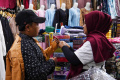 penjualan-seragam-laris-manis-di-ps-kepanjen-kabupaten-malang_20240708_143601.jpg