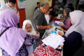 penjualan-seragan-sekolah-di-bandung-meningkat-jelang-tahun_20240712_145042.jpg