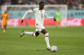 Penyerang AS Timothy Weah Mengiring Bola